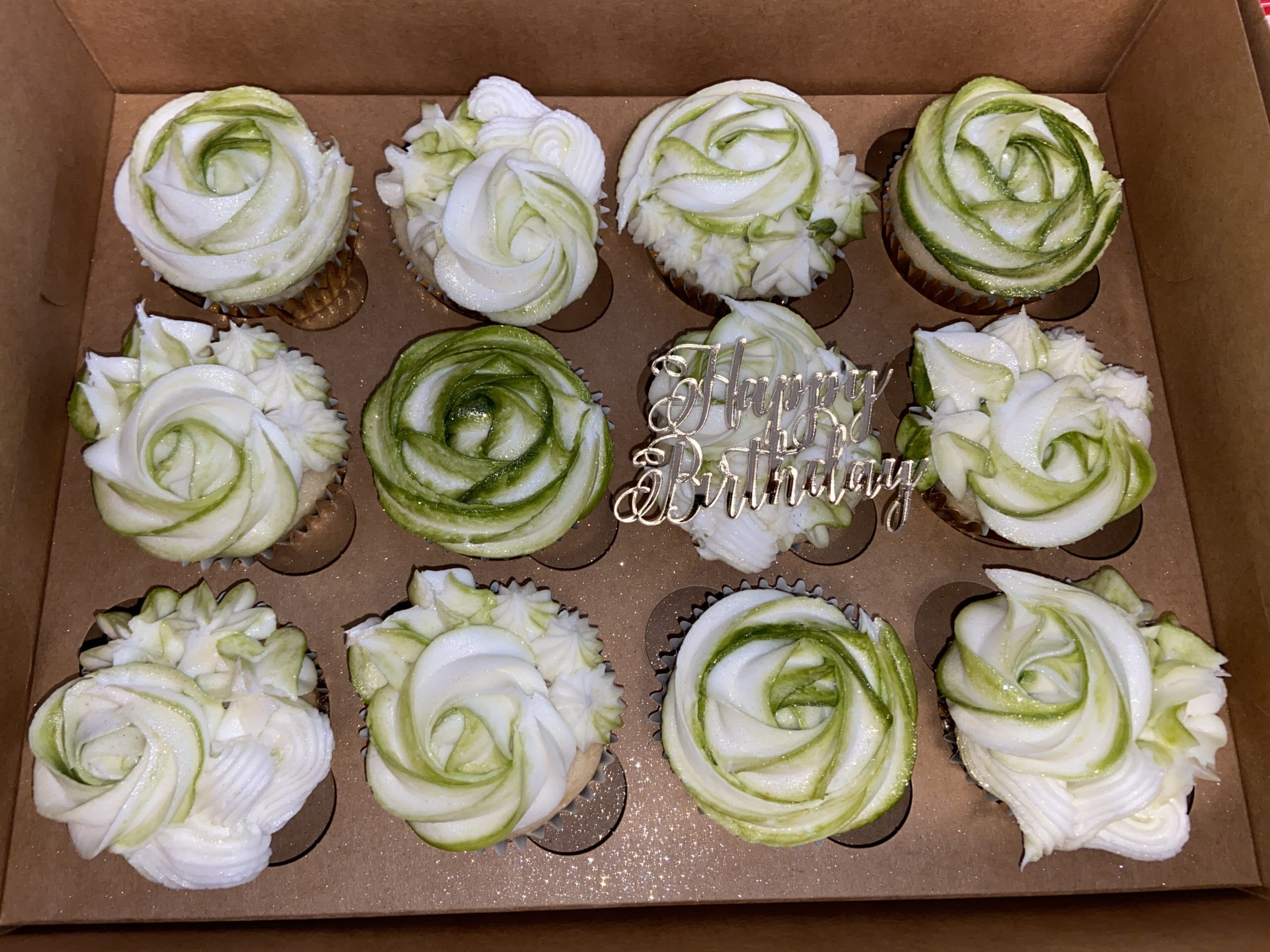 Green and white gourmet cupcakes